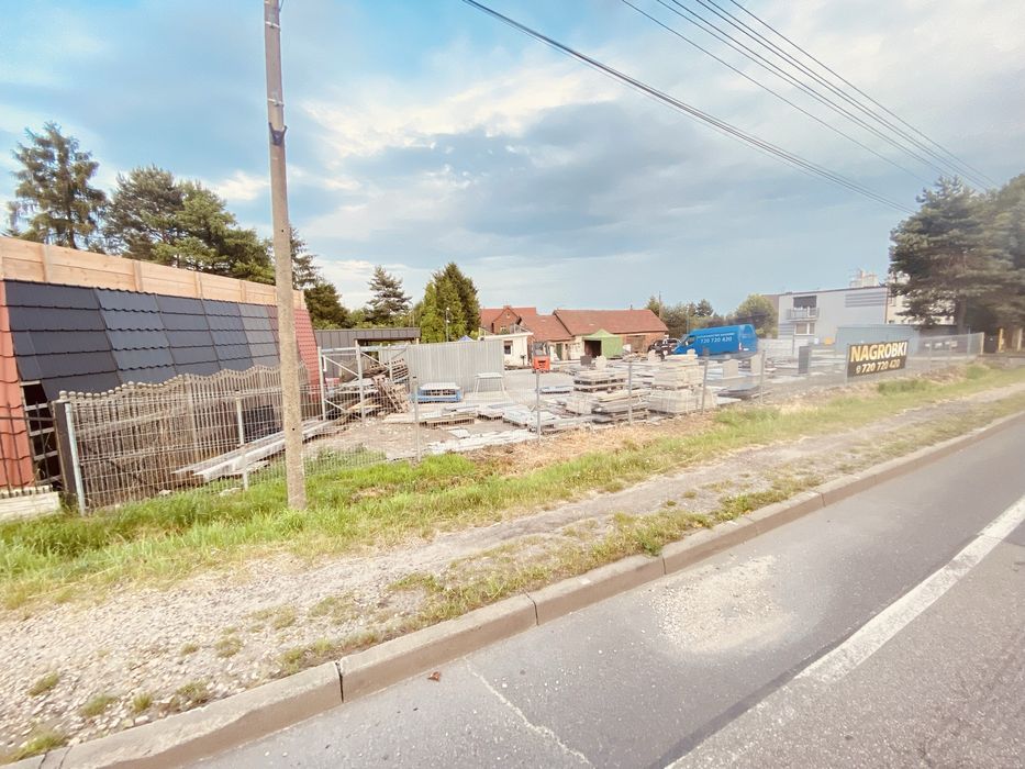 sprzedam działkę z budynkami na działalnoć gospodarczą przy  drodze
