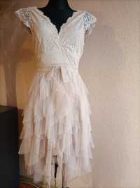 Sukienka tiulowa z kokardką w rozmiarze L.