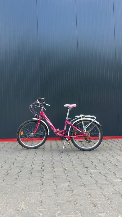 Różowy rower romet panda
