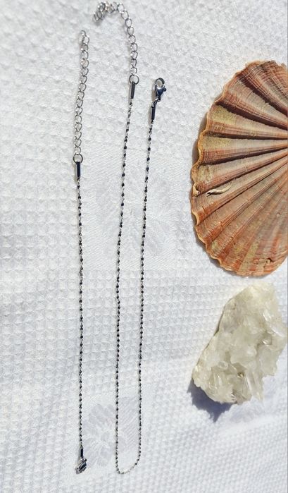 Conjunto de colar e pulseira de aço inoxidável prateado