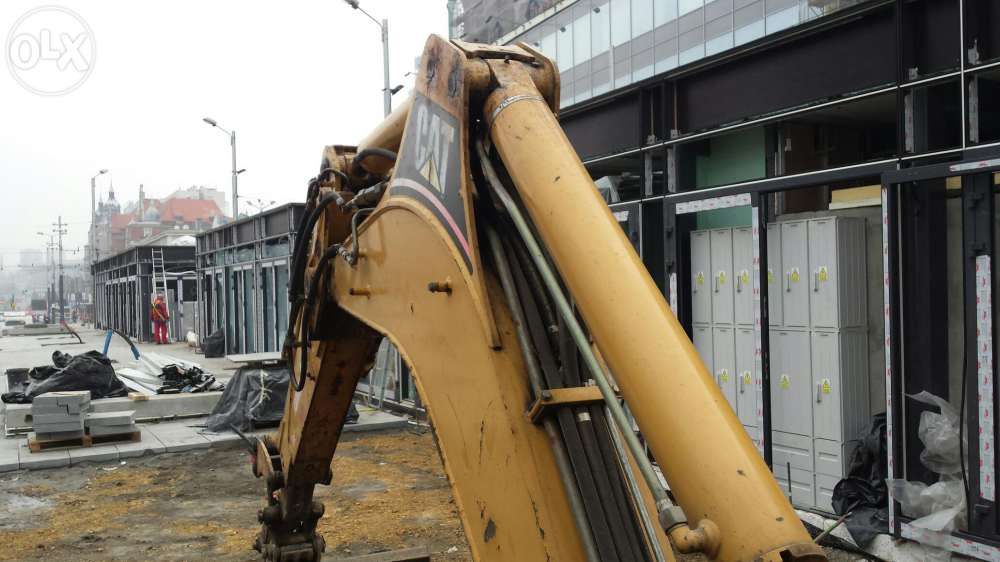 uslugi koparko-ładowarka wynajem minikoparka katowice ruda śląska cat