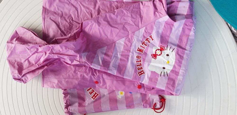 Impermeável e Saco - 8 anos Novo