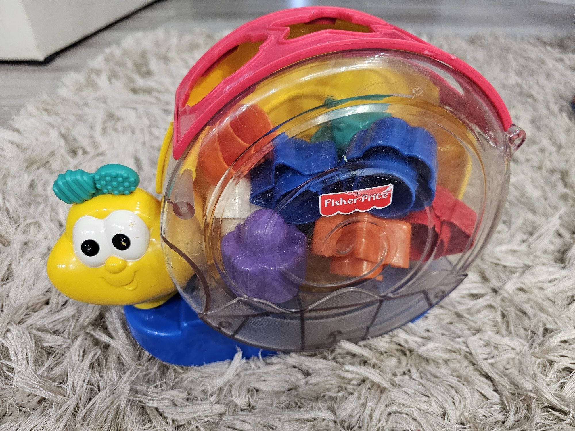 Sorter Fisher price ślimak klocki