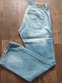 Чоловічі джинси у євро розмірі 34
