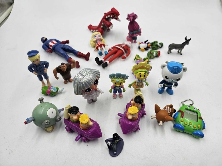 Zestaw mini zabawek figurki Flintstonowie Fifi Niezapominajka i inne