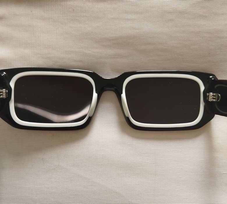 Óculos de sol Prada como novos