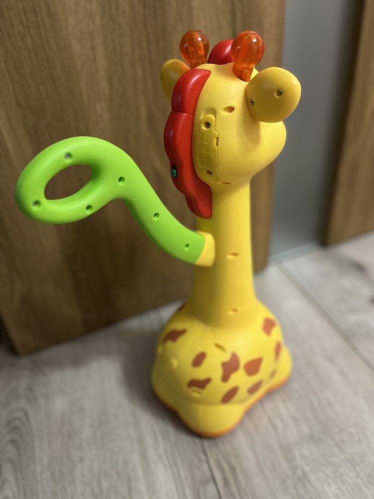 Zabawka żyrafa, strzelające piłki