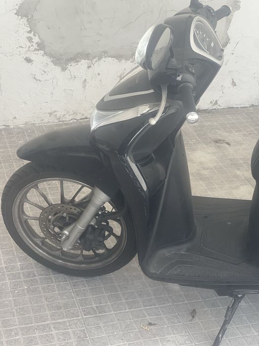 Mota em bom estado . Hoda 125 sh
