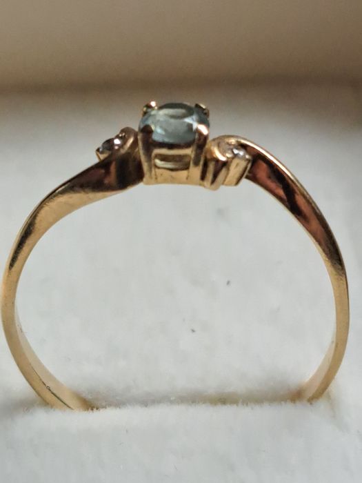 Złoty pierscionek z topazem i diamentami 585 certyfikat