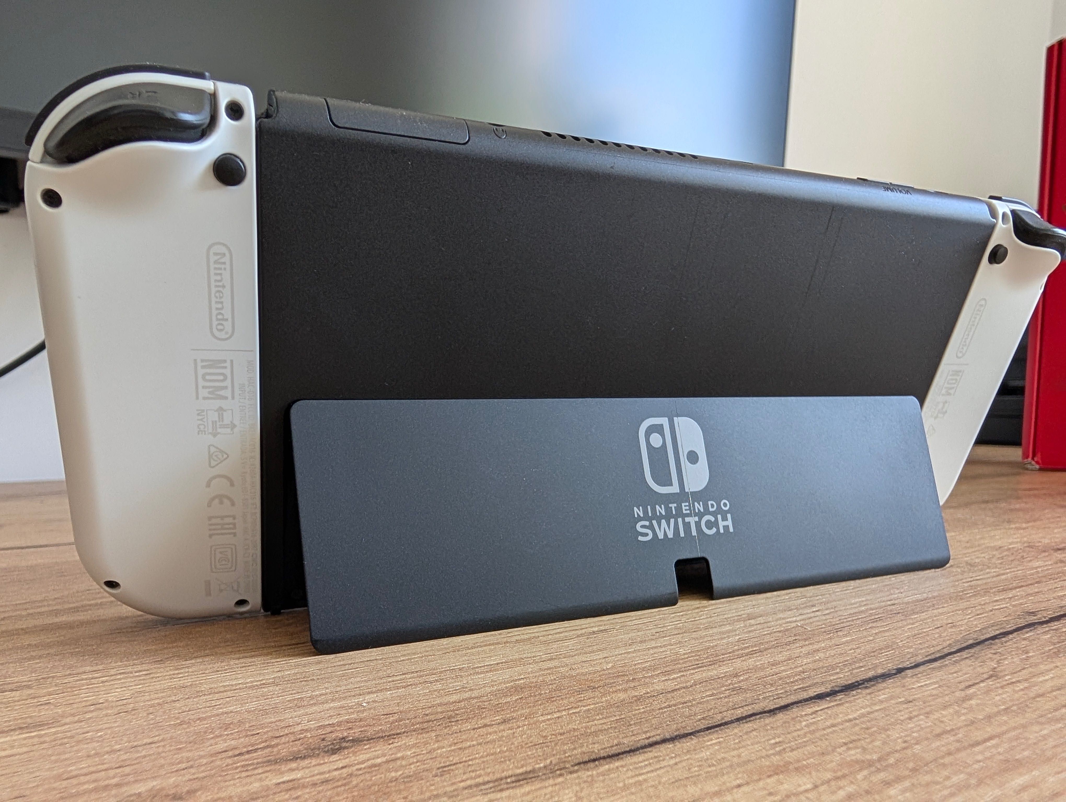 Nintendo Switch OLED, super stan, oryginalny zestaw, dużo dodatków