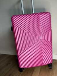 Nowa walizka średnia - bagaż do 23 kg