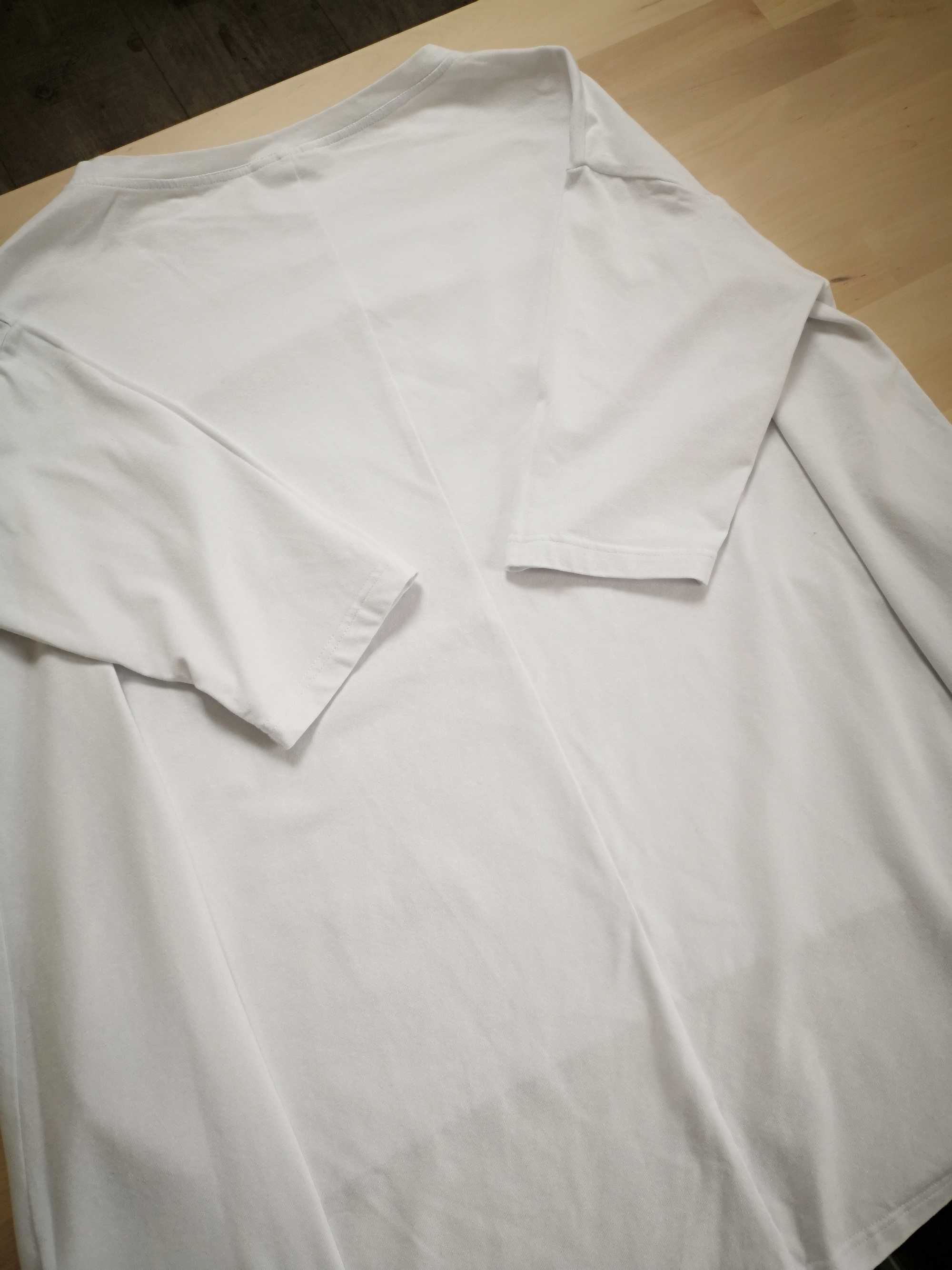 biała bluzka z kieszeniami oversize dłuższy tył tunika rękawy 3/4
