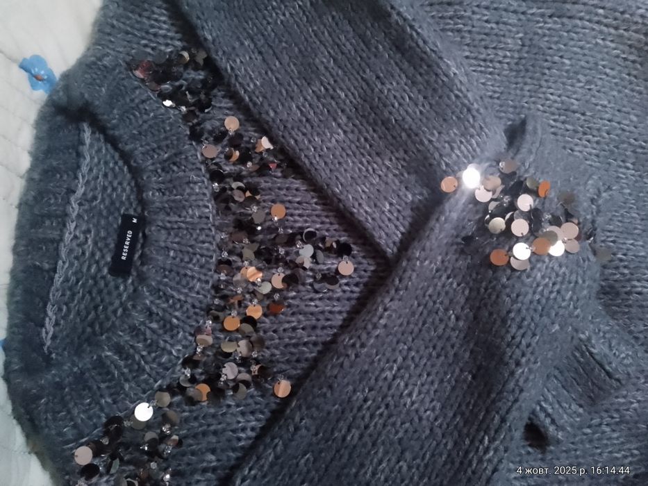 Светри, безрукавки  жіночі 44