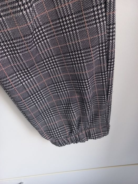 Calças de xadrez, super confortáveis com  2 bolsos. Elástico na  cintu