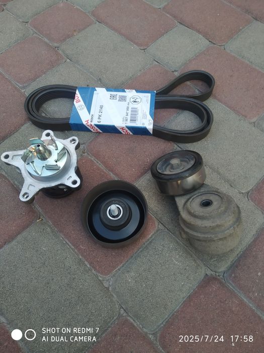 Ролік Kia Hyundai натяжний та обвідний