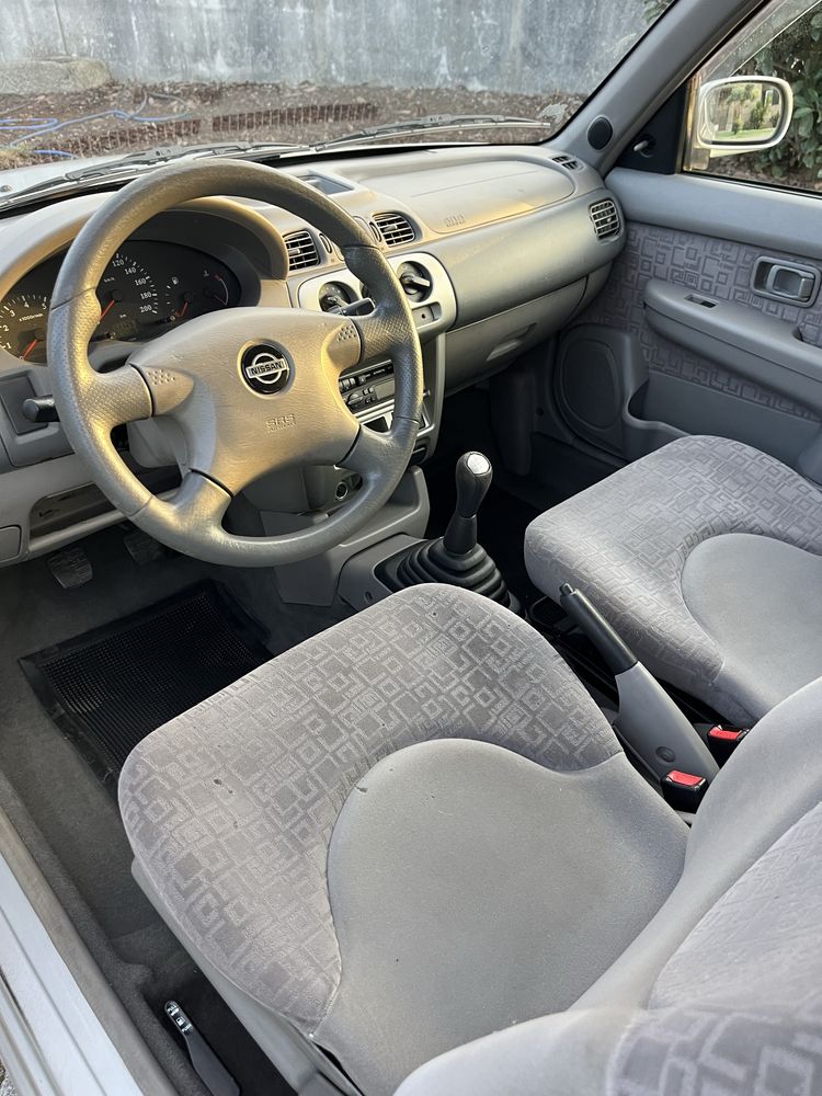 Nissan micra com AC, poucos KM