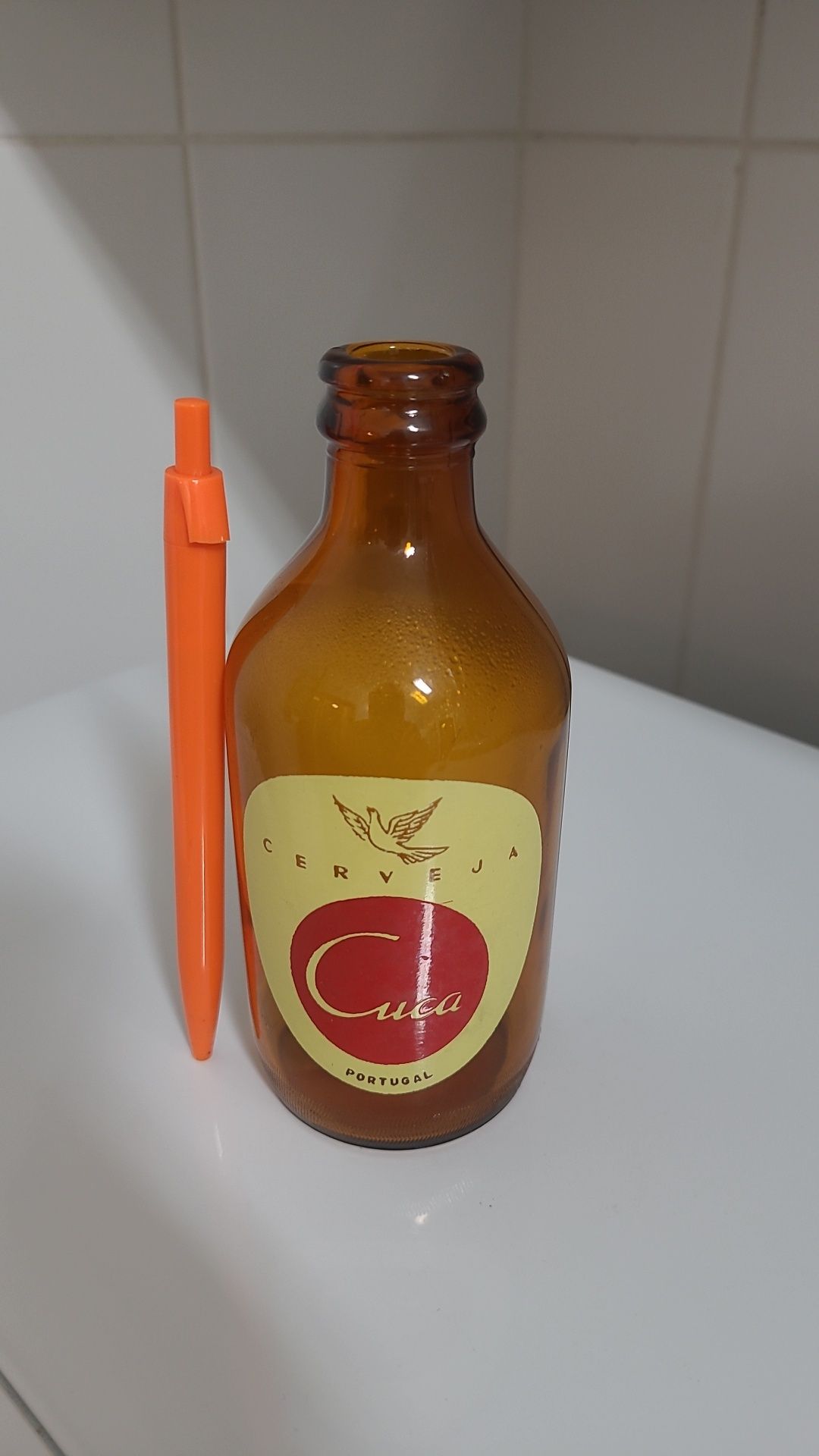 Garrafa pirogravada da antiga cerveja Angolana CUCA