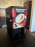 Retro automat do kawy Nescafé
