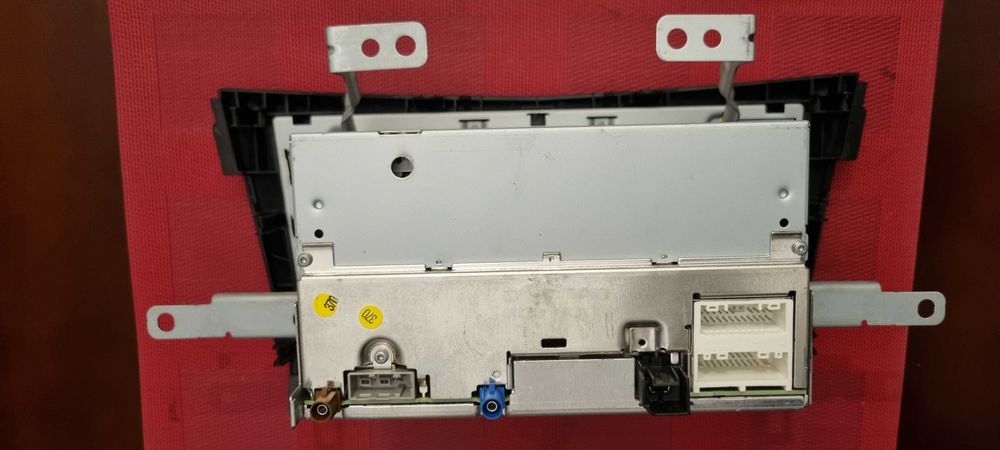 Nissan J11 radio/nawigacja, panel AC