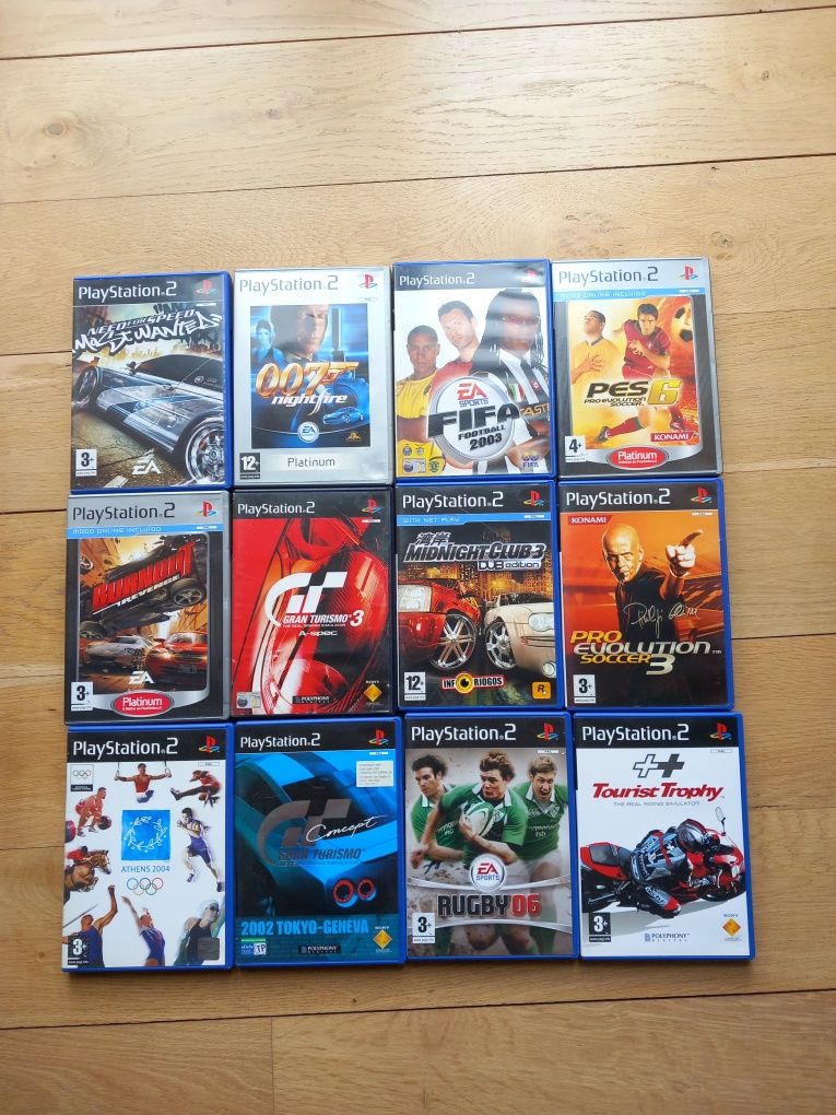 Playstation 2 com 12 jogos + comando +cartão de memória + cabos.