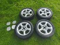 Oryginalne felgi aluminiowe r15 ford 4x108