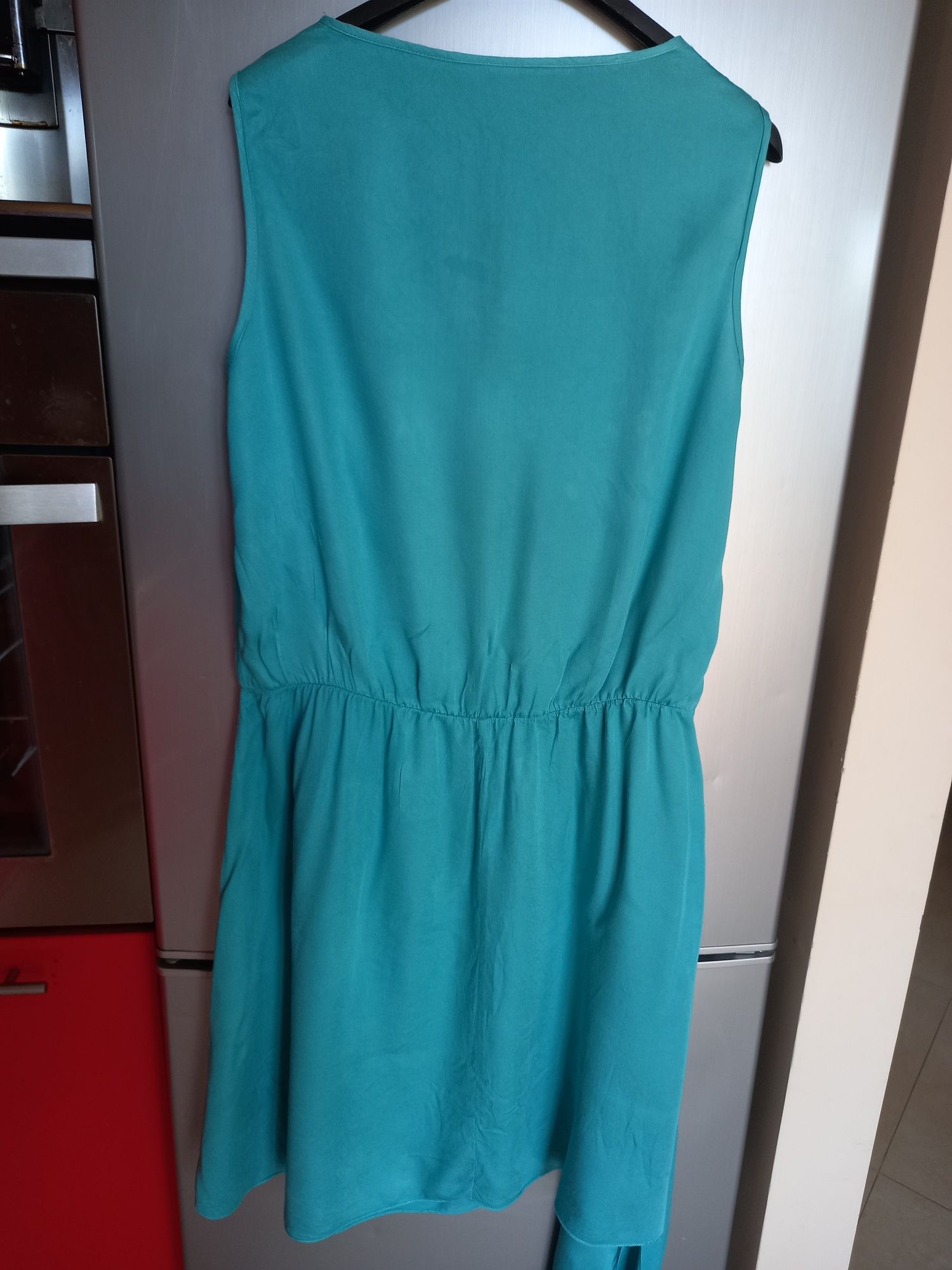 Sukienka lazurowa niebieska wiązana 42 lato Jak Nowa