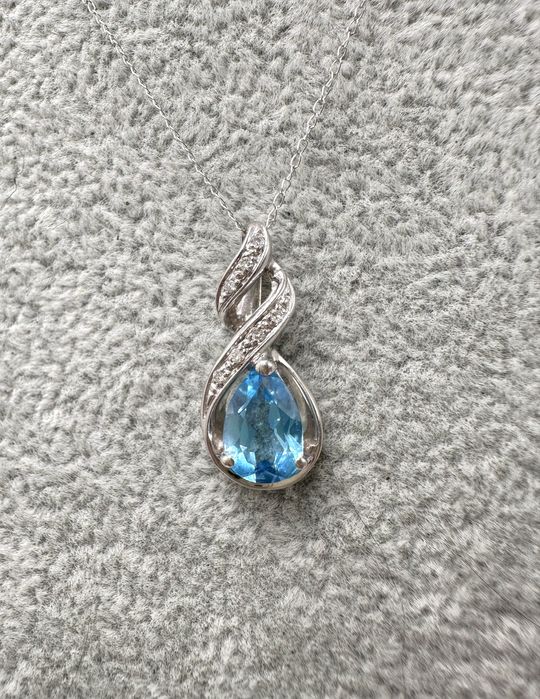 Złoty naszyjnik z topazem 1,15ct i diamentami 0,07ct