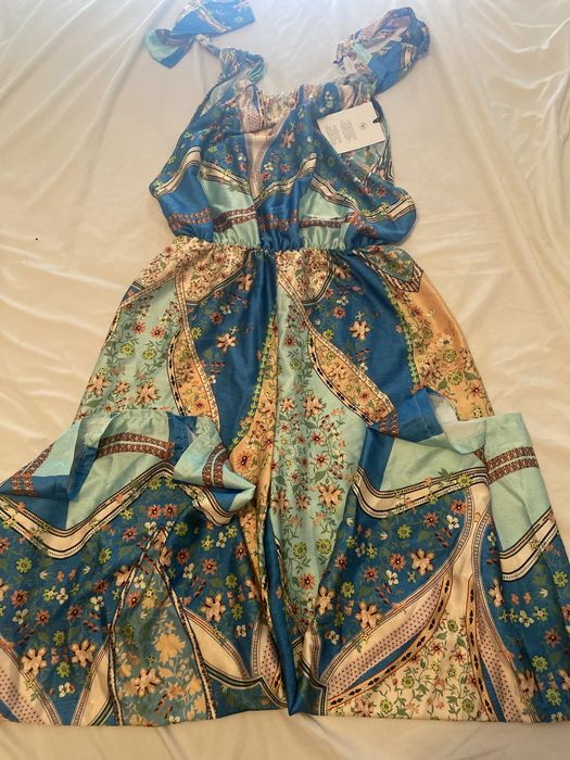 Macacão novo e com etiqueta