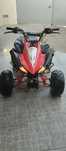 Moto 4 125cm3 a andar bem com pneus traseiros gastos