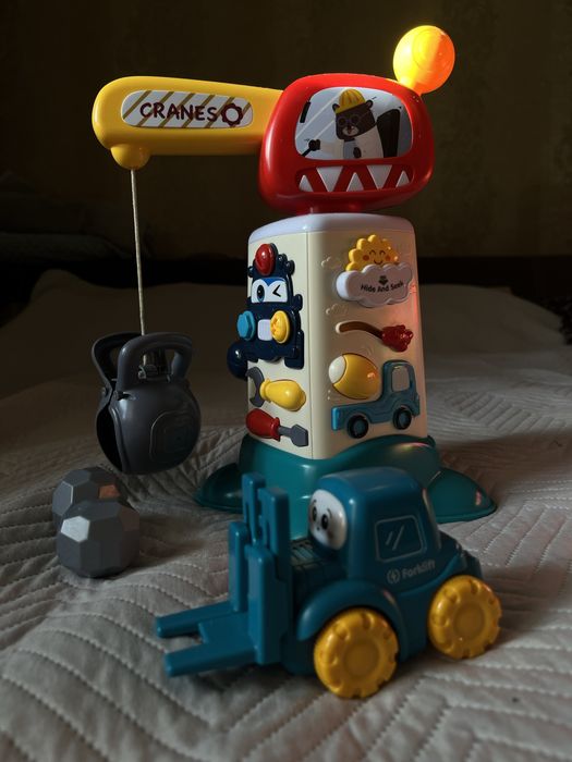 Дятяча іграшка кран