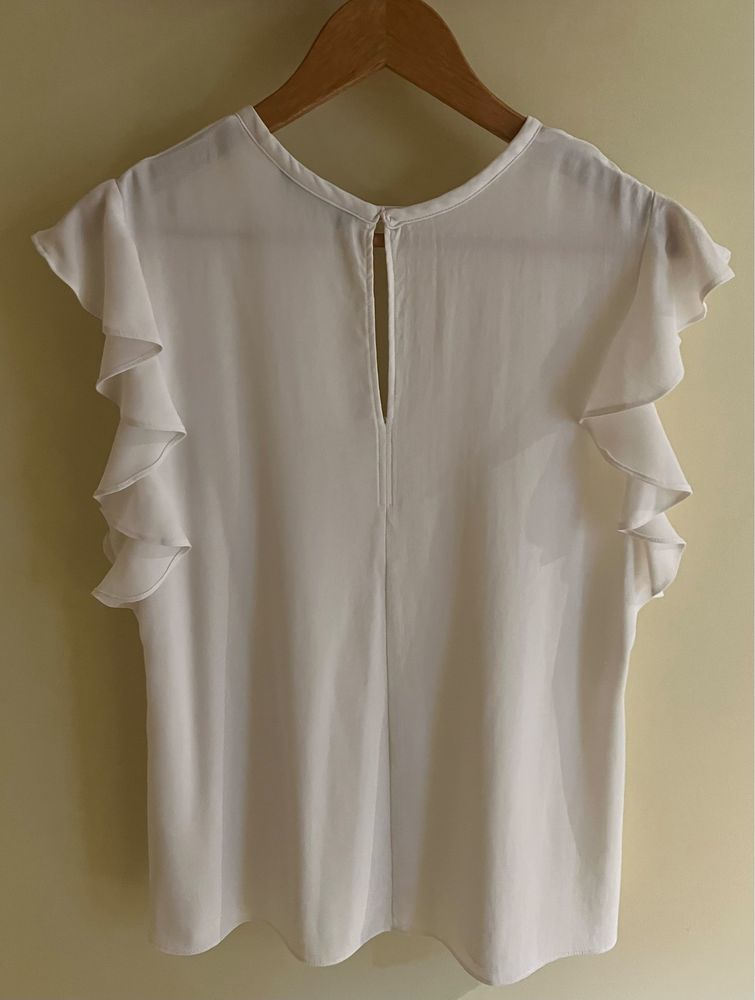 Blusa com folhos