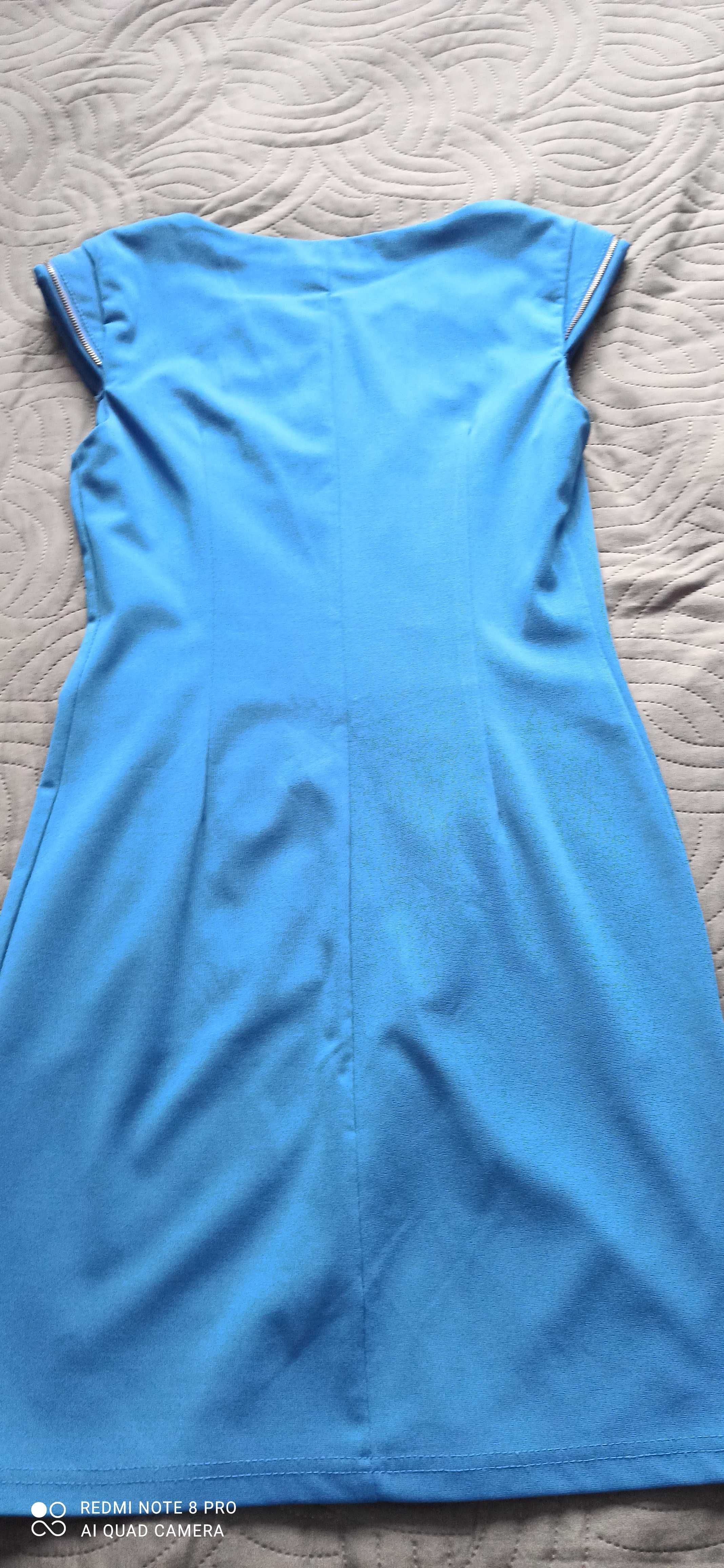 Niebieska sukienka z suwakiem