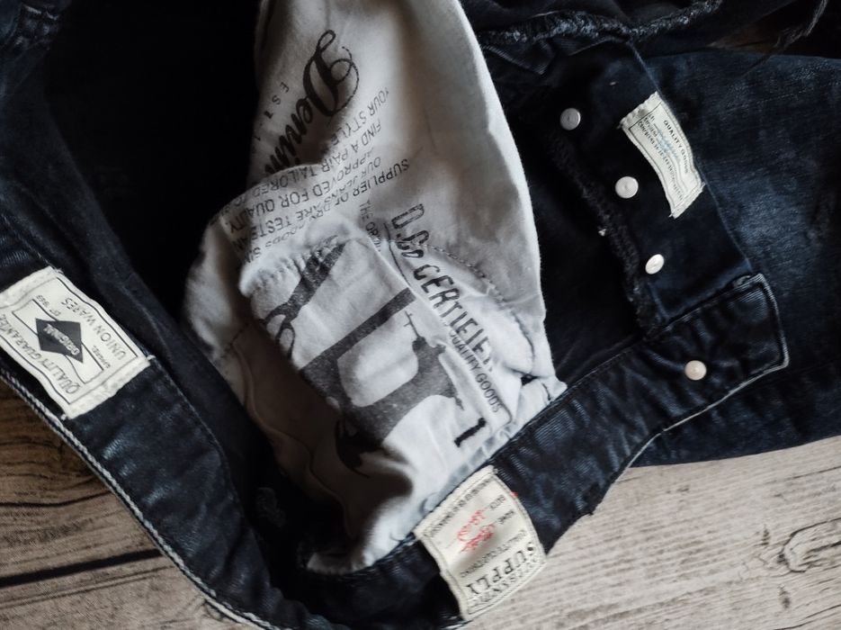 Authentic supply jeansy męskie z dziurami