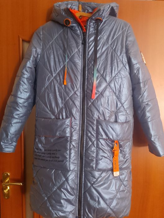 Тепла подовжена куртка на дівчинку