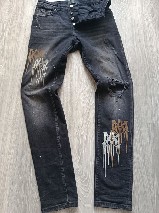 Джинсы amiri рваные