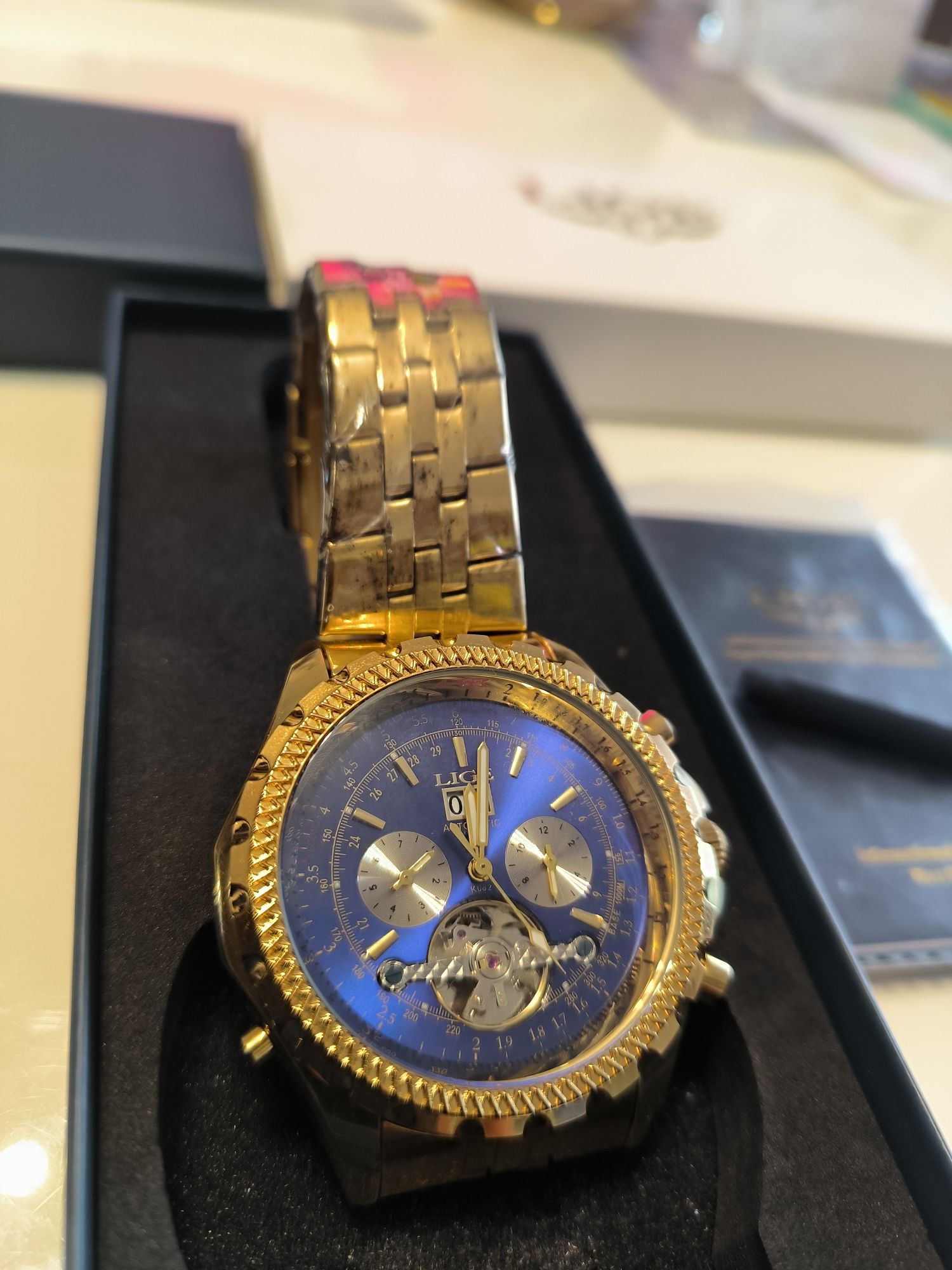 Zegarek Lige męski z Tourbillonem , złoty i duży .