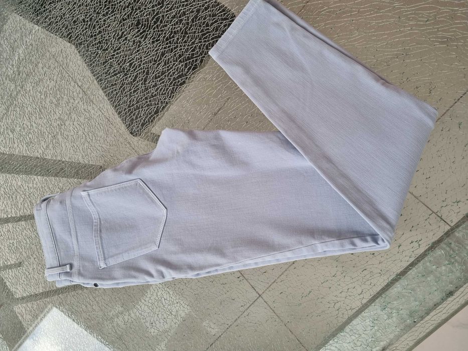 Spodnie Tommy Hilfiger rozmiar 27/30 nowe bez metki strech jasny niebi