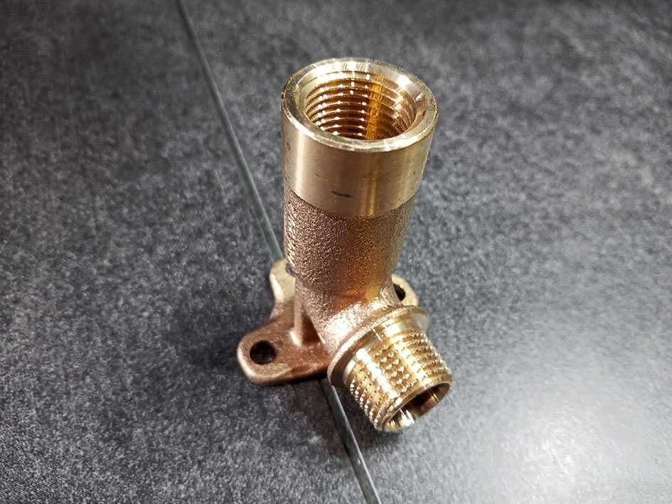 Geberit Mepla kolano z łapą 1/2 73 mm