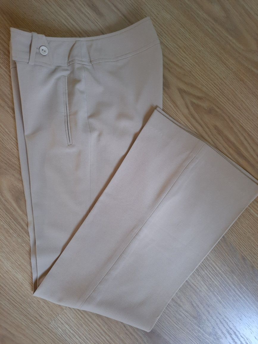 Eleganckie garniturowe spodnie dzwony  szerokie nogawki Tiffi S