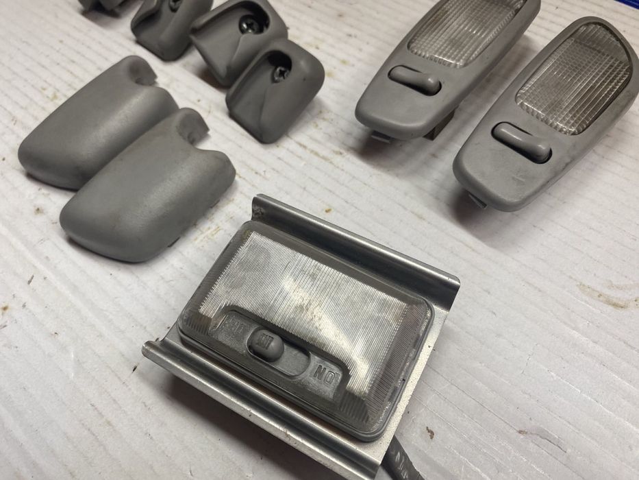 Плафони заглушки світильники кріплення вимикачі світла салону Лансер 9