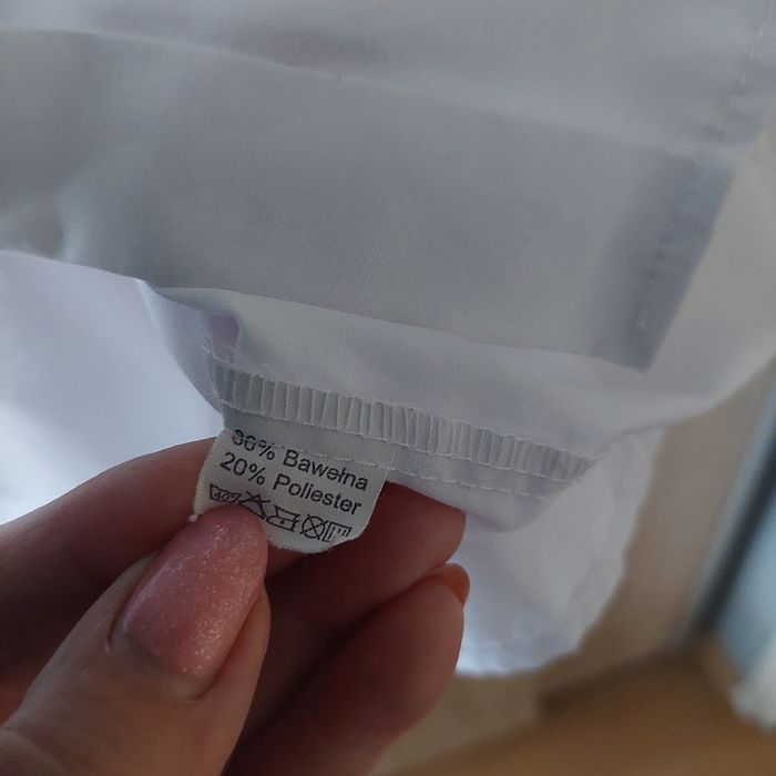 Biała koszula r. 152