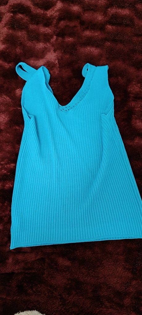 Top azul turquesa tamanho M, usada