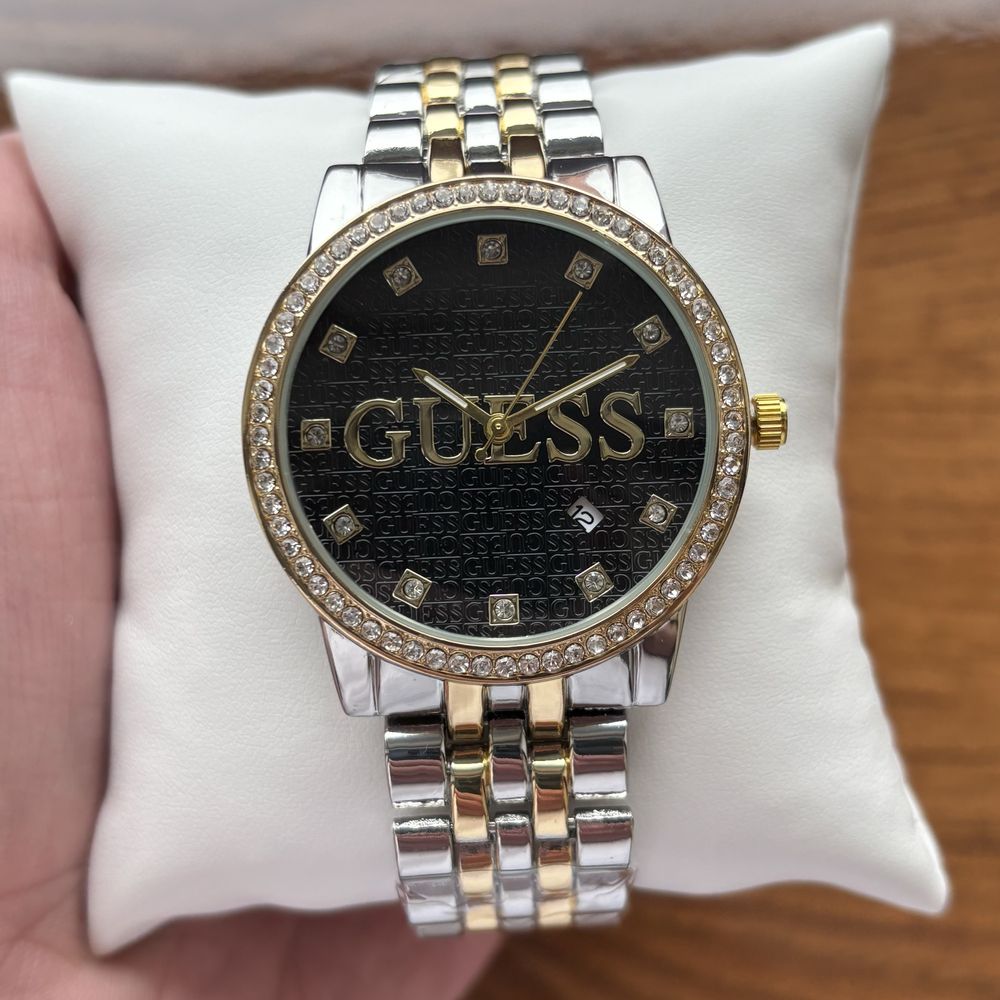 Жіночий годинник Guess на браслеті комбінованого кольору з датою