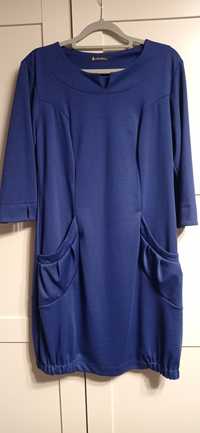 Niebieska sukienka sportowa typu bombka z kieszeniami