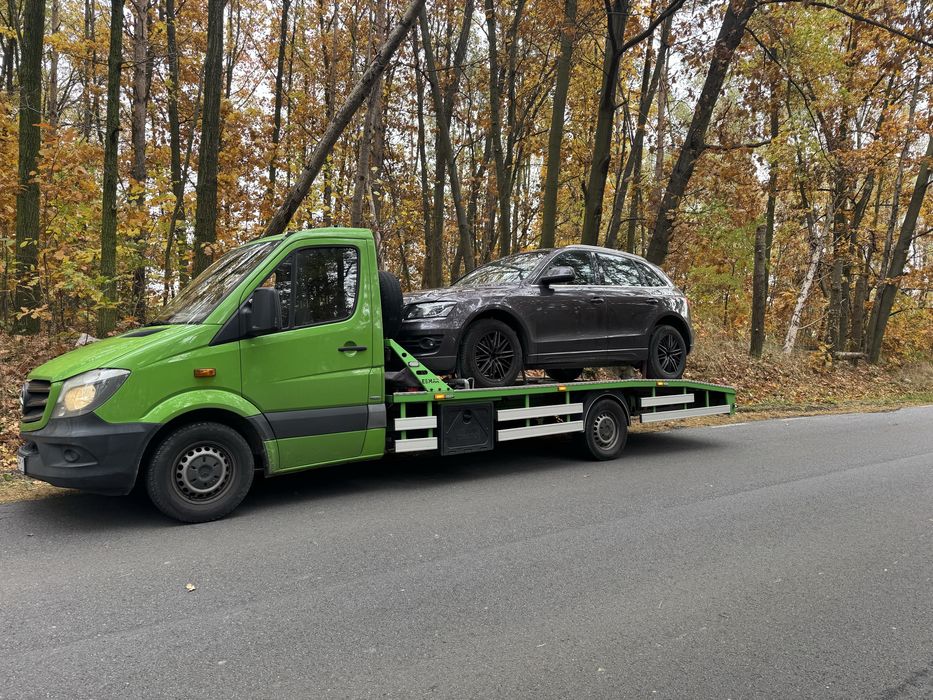 Pomoc drogowa laweta holownik