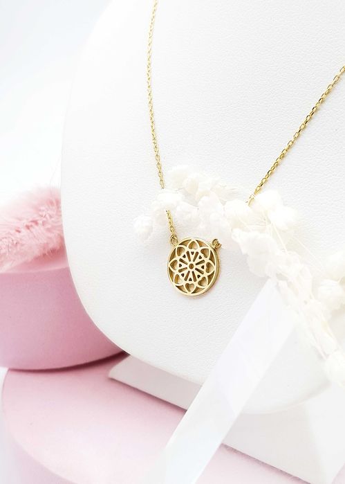 Złota celebrytka z ażurowym kółkiem z kwiatowym wzorem pr. 585