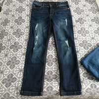 Spodnie jeans dziury rozmiar 134