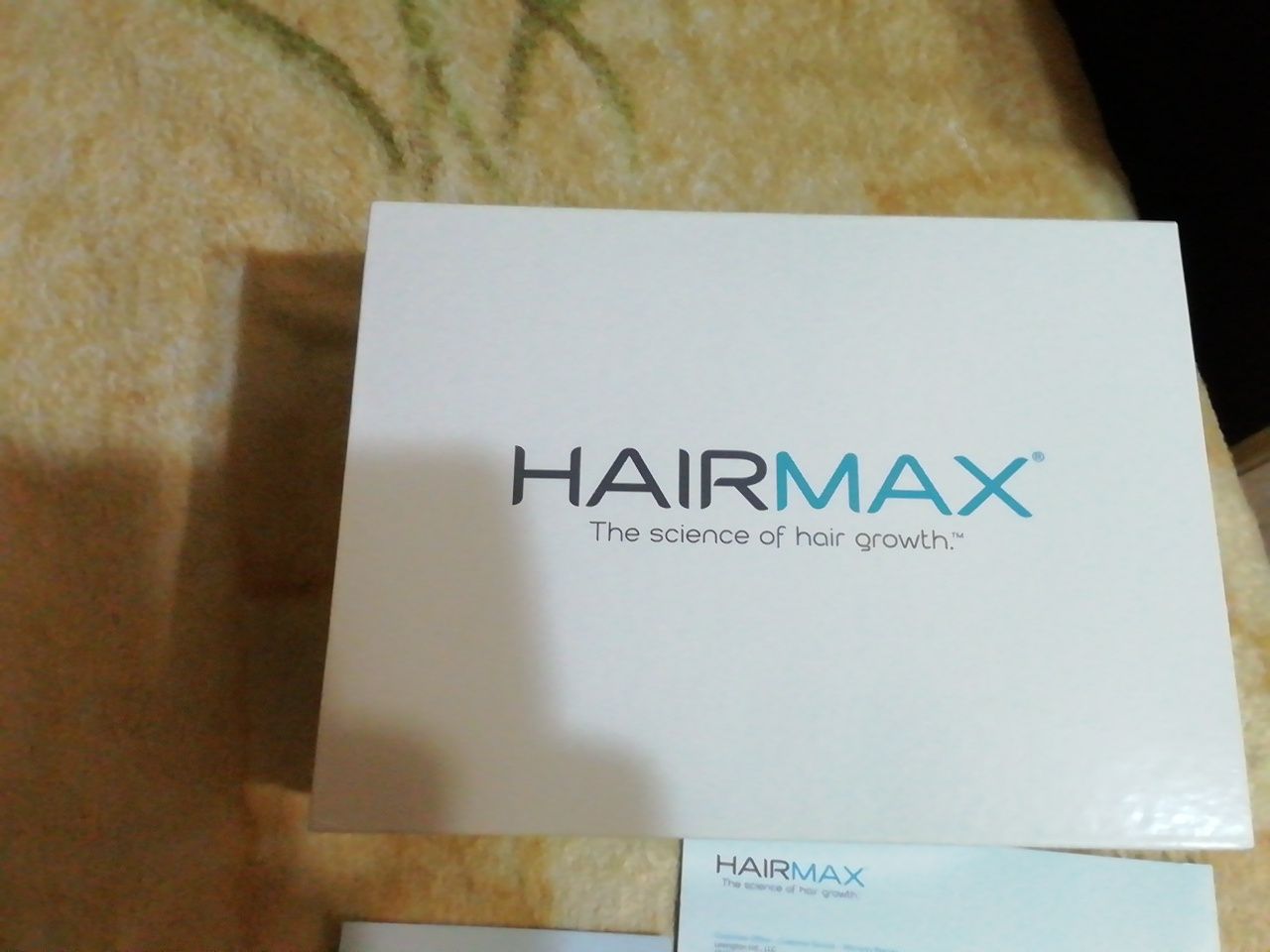 Лазерний гребінець HairMax.