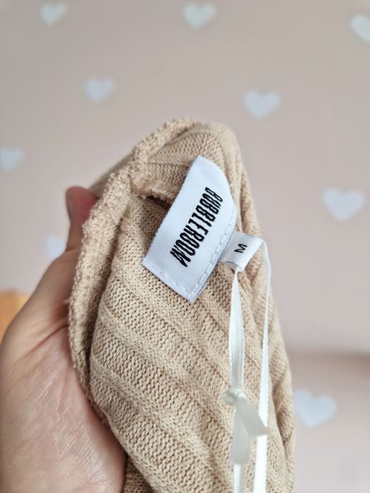 Spodnie materiałowe beżowe rozkloszowane szerokie dzwony prążkowane bu