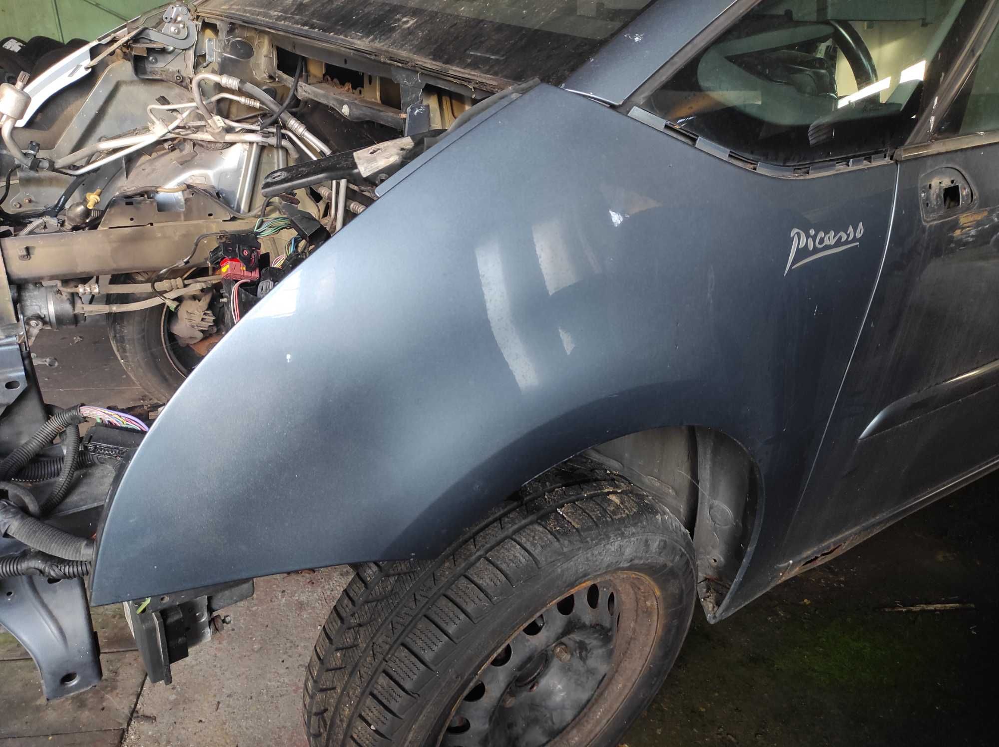C4 Picasso Grand Picasso 2007 r błotnik lewy EZWD